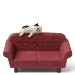 Figurine Cat On Red Sofa